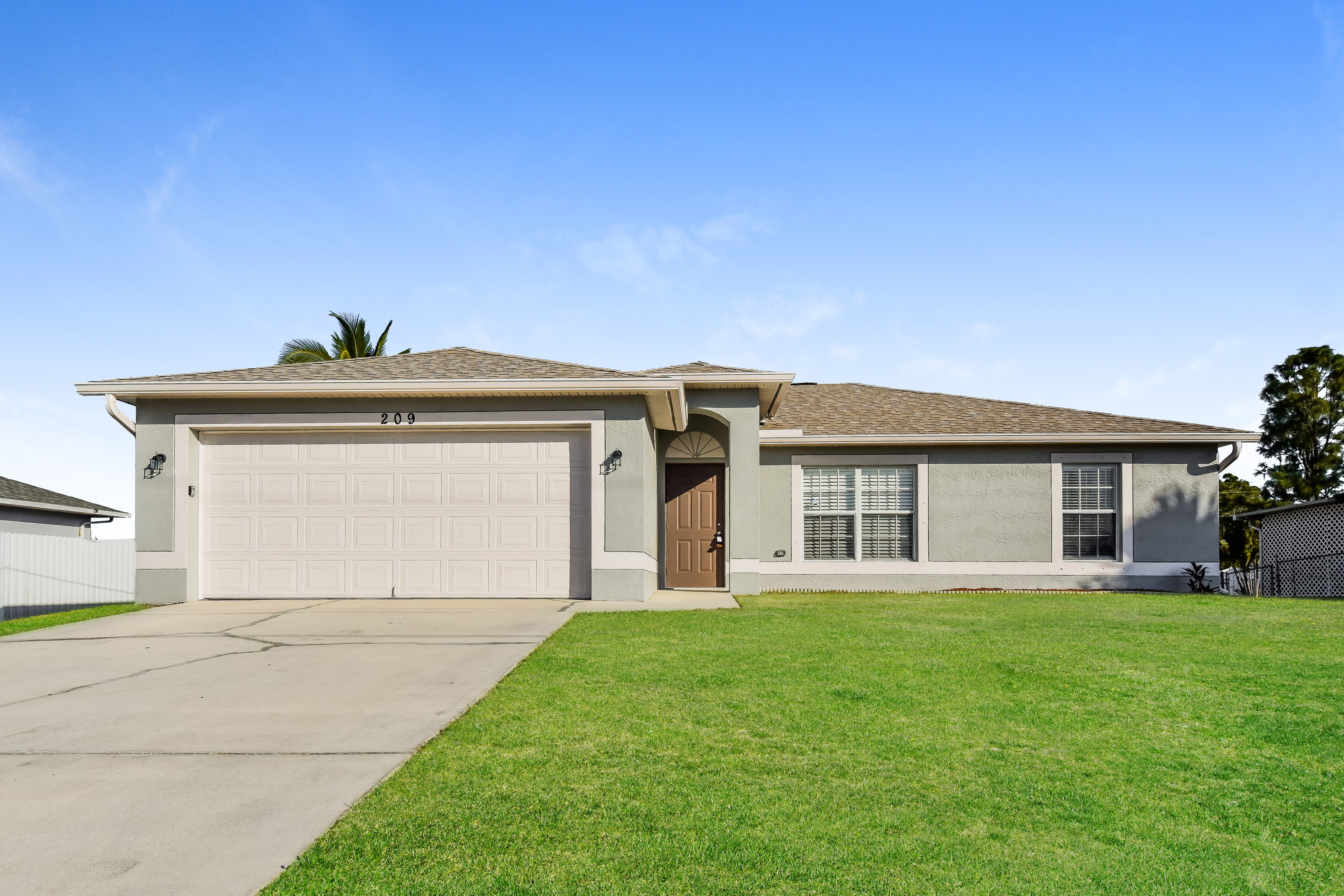 209 N W 14TH ST CAPE CORAL, FL 33993